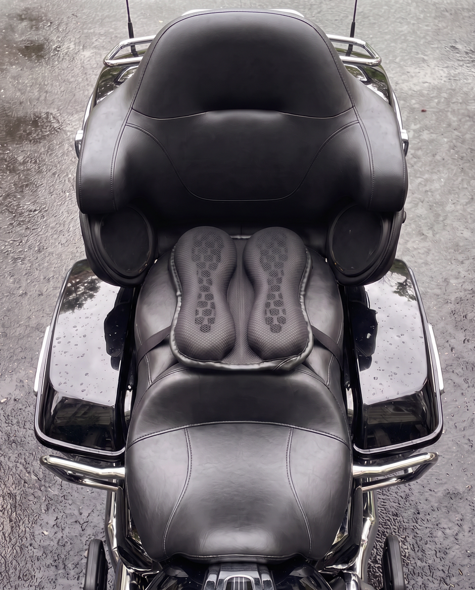 MotoCush Gel Passenger Pad on the pillion seat of a touring motorcycle, seen from above