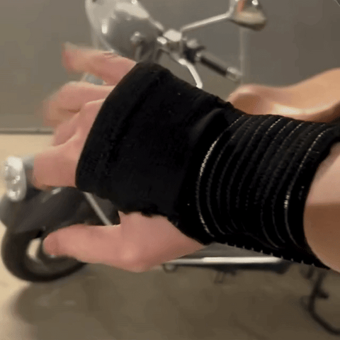 Clip: MotoWrap on the wrist, hand on the throttle