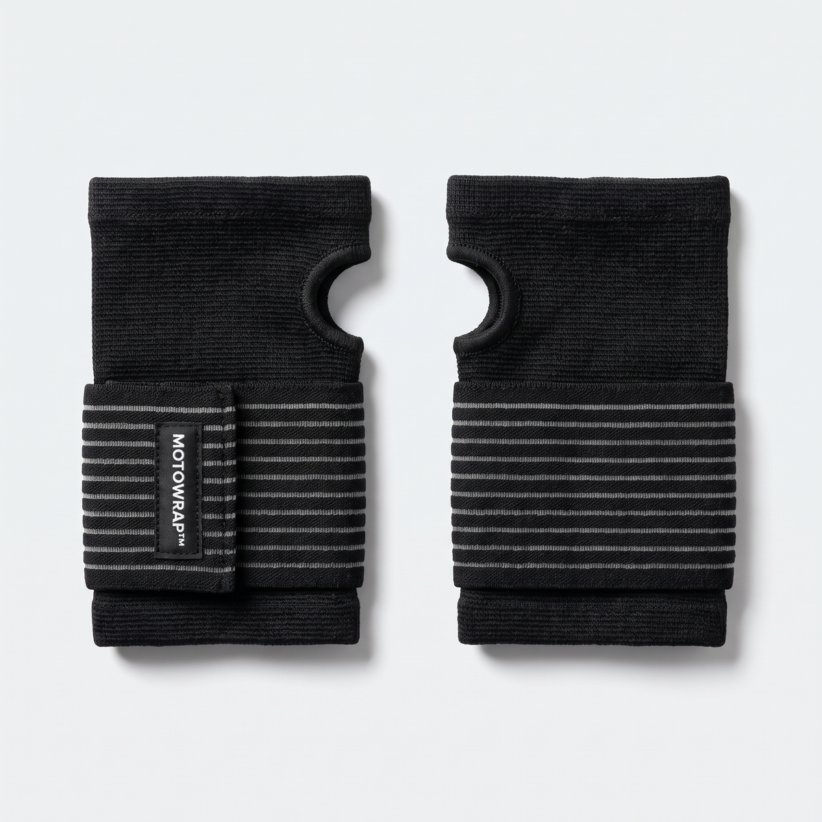 A pair of MotoWrap wrist supports lying flat